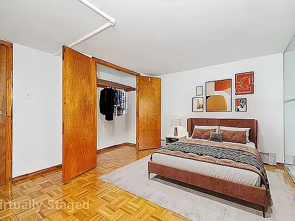 5th image of 212 E 10th St APT 4A