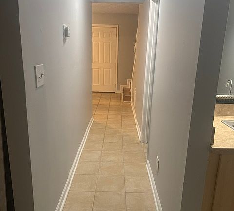 First floor hallway view back to front