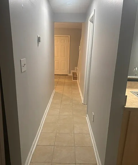First floor hallway view back to front