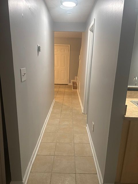 First floor hallway view back to front