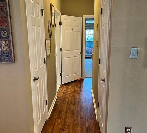 hallway to bedrooms and bath, 1 hall closet, 1 closet with HVAC and storage shelves (fits vacuum/swiffer/tool kits)