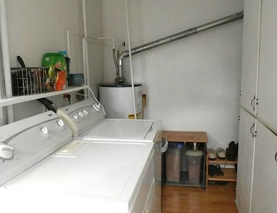 Here is the laundry room, washer and dryer stay.