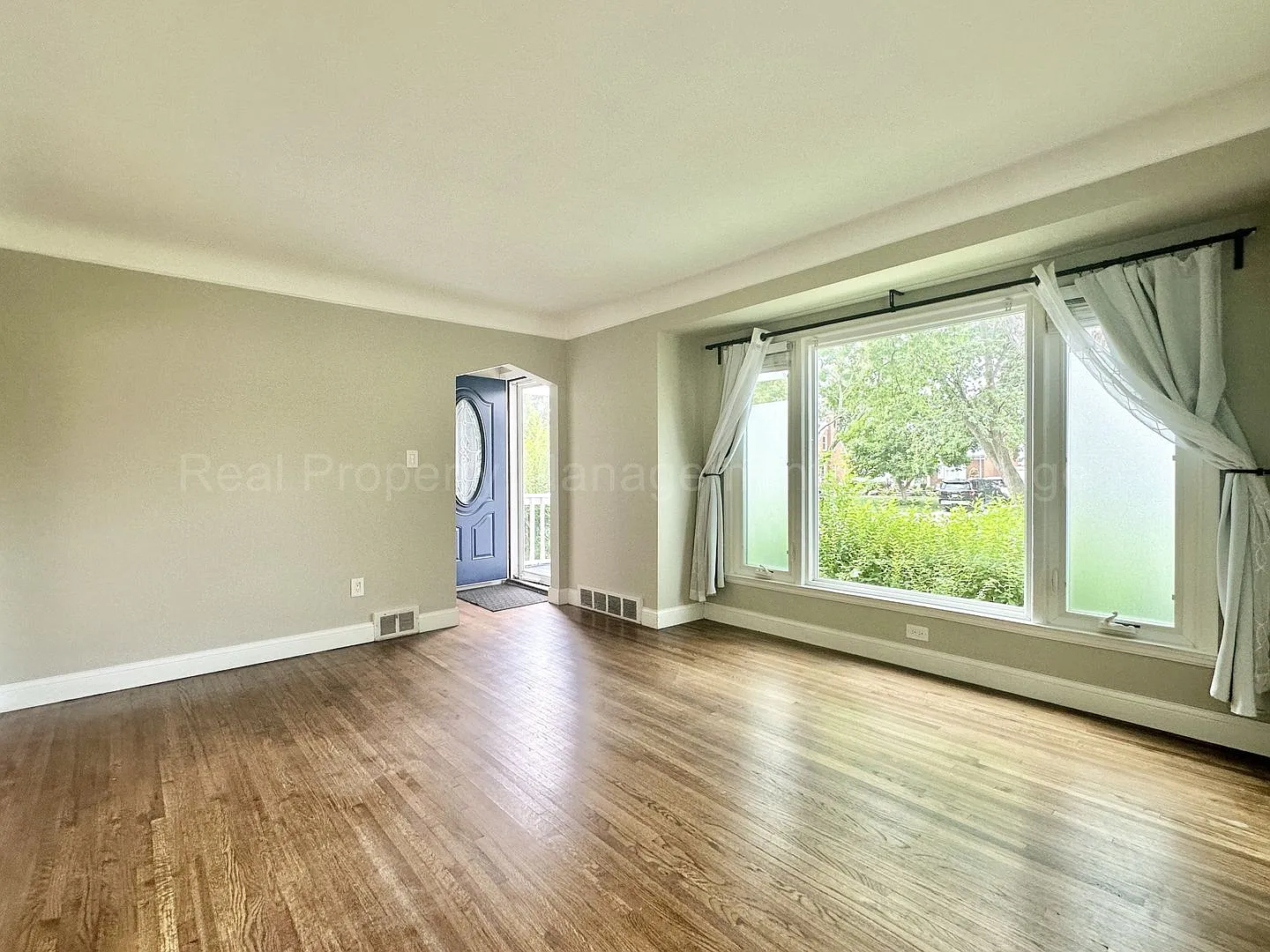 Charming Royal Oak 3-Bed with Sunroom, Deck, and 2.5-Car Garage — Photo 4