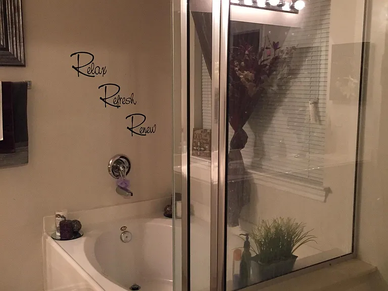 Master bedroom en suite with garden tub and standalone showe