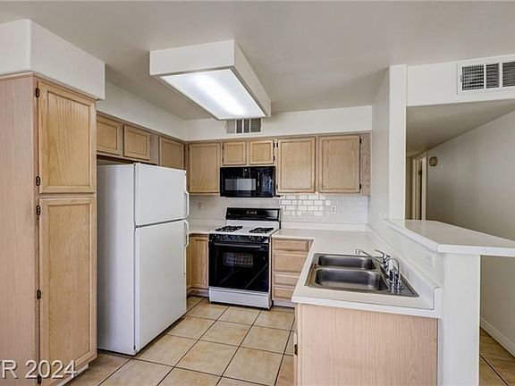 3rd image of 3425 E Russell Rd Unit 220