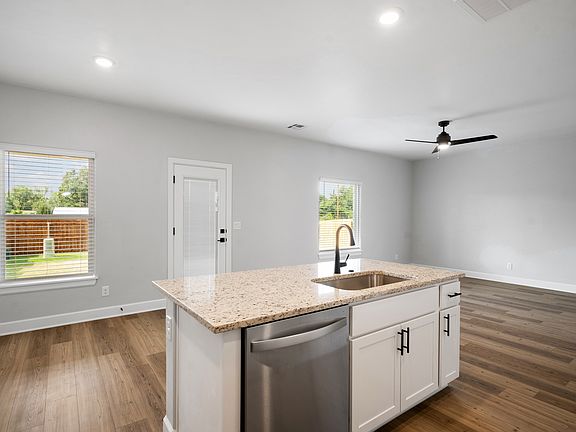 The kitchen has a wonderful kitchen island.