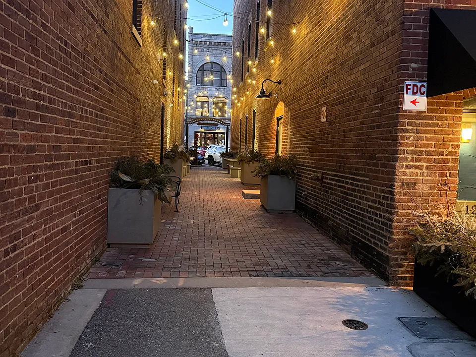Alley & Main passage from N Main to City Parking Lot and Residential Access Points