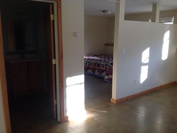 view into bedroom from main area