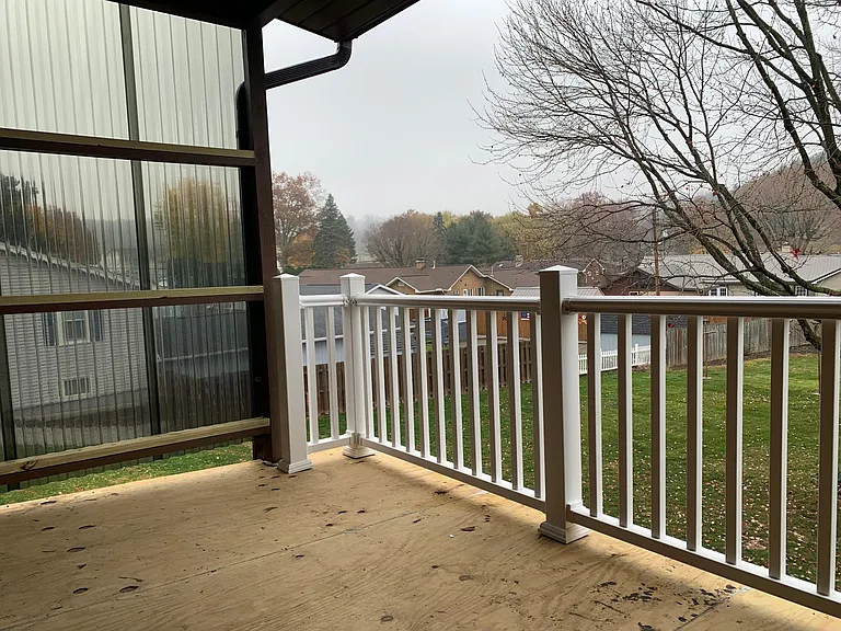 View from back porch. New outdoor carpet to be installed when the weather will allow.
