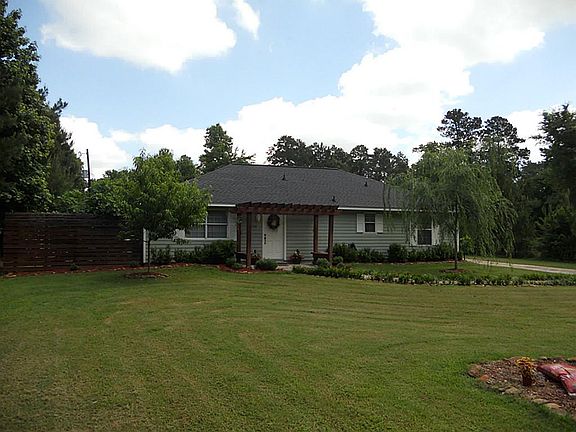 The curb appeal of this home is adorable.