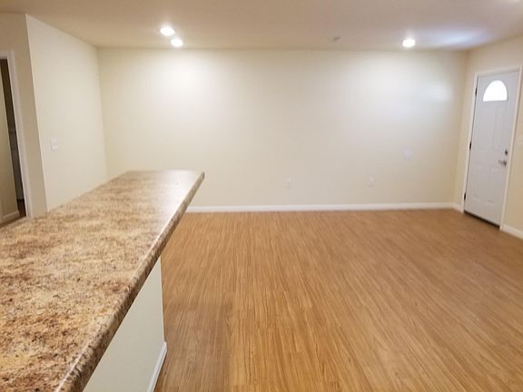 View from the far wall toward the front door