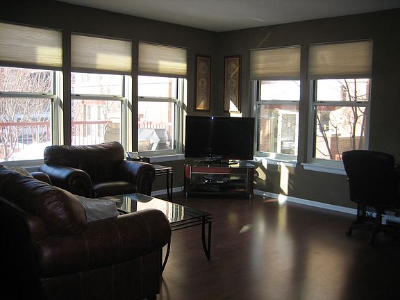 Living Room with custom blinds open
