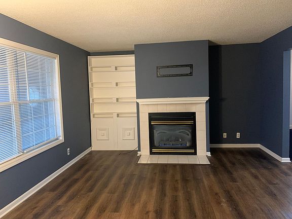 Living room featuring a gas fireplace.