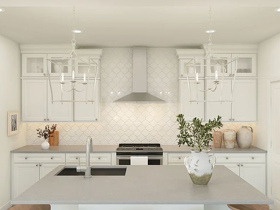 Kitchen with pendant lighting and hexagonal backsplash