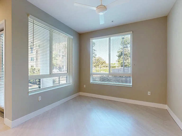 Apartment Living Room with Wood-Style Flooring.