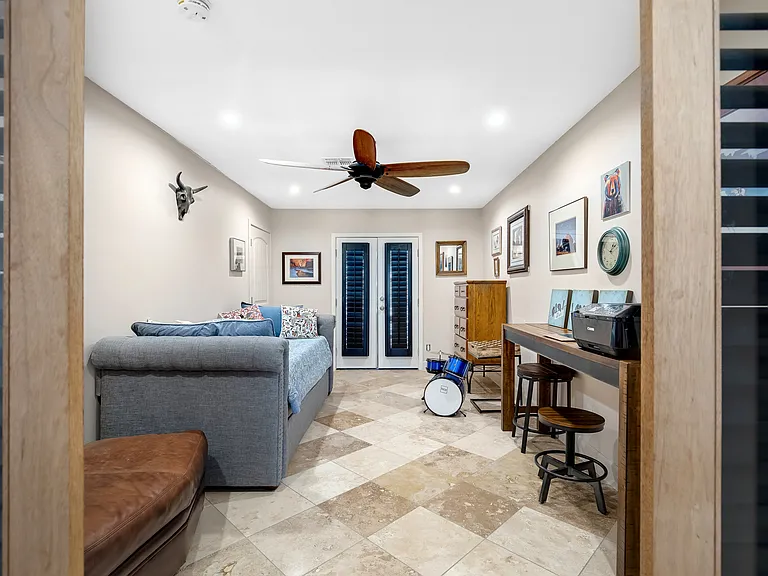 Private bedroom with access to backyard.