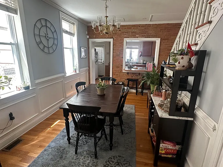 Dining room with bar cut out to kitchen, 2024