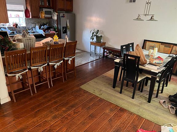Dining area and kitchen. Bar stools can stay as well as dining room table and chairs.