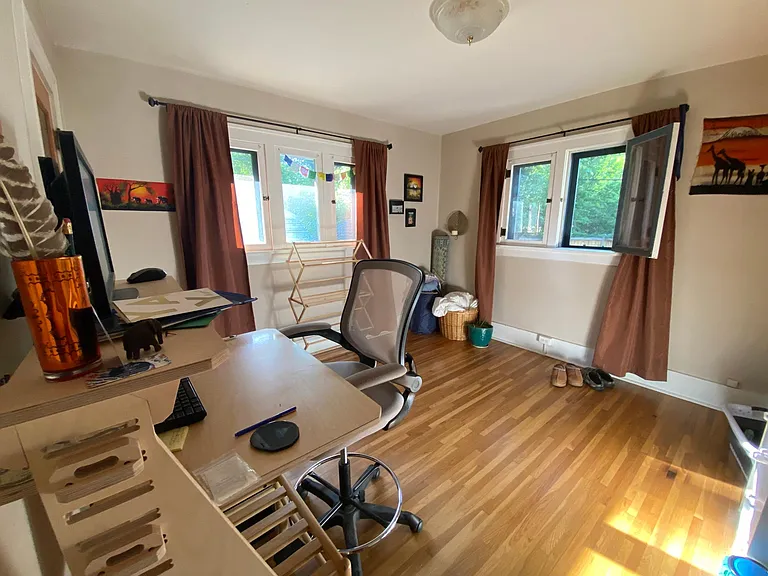 April 2025-Back bedroom with same window set up. Right window overlooks the back yard