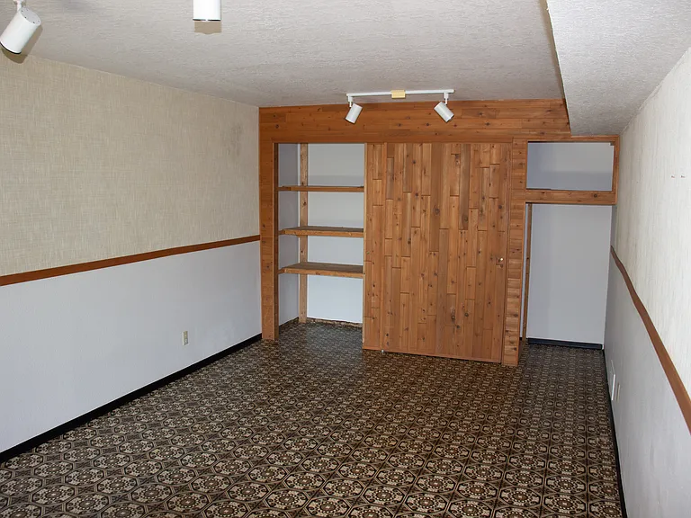 Downstairs bedroom 3 with separate entrance to yard and patio
