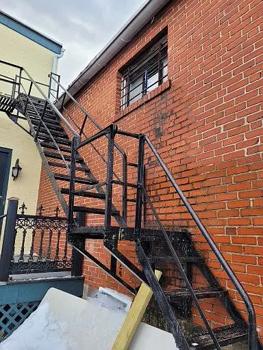Fire escape to parking lot, one parking spot for REAR apt