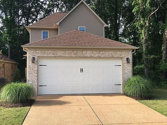 Front drive and garage