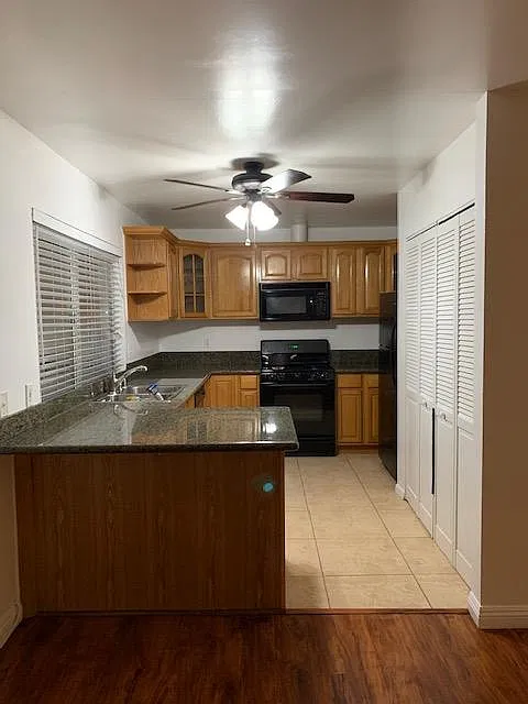 Large Kitchen dishwasher, stove/oven, microwave hood, refrigerator with ice maker.