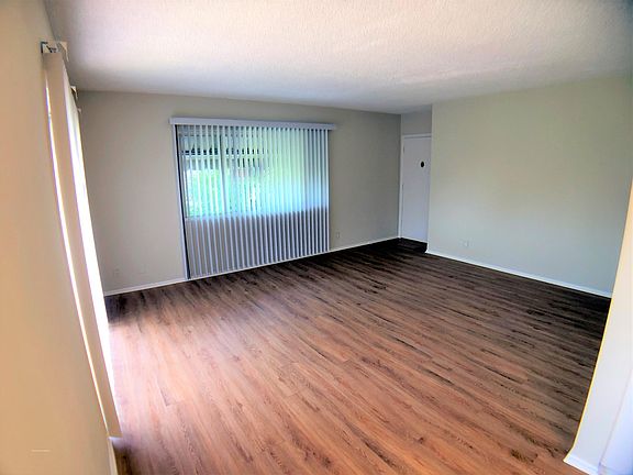 living and dining area with entrance to the right from Kitchen