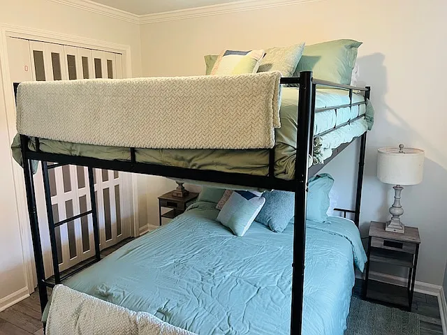 Master back bedroom has full size dresser and two walk-in closets