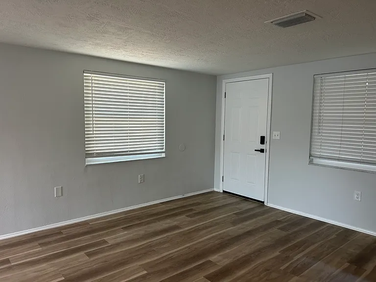 Brand new windows, sliding glass door, blinds and front door