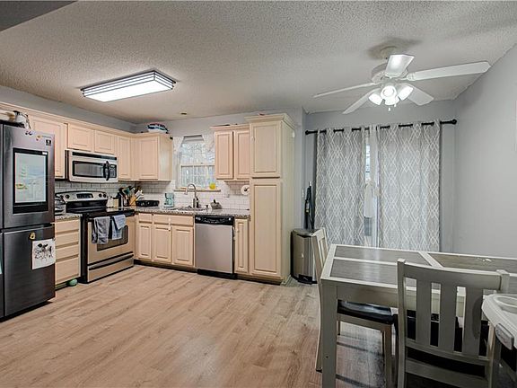 3rd image of 10631 E 46th Ter