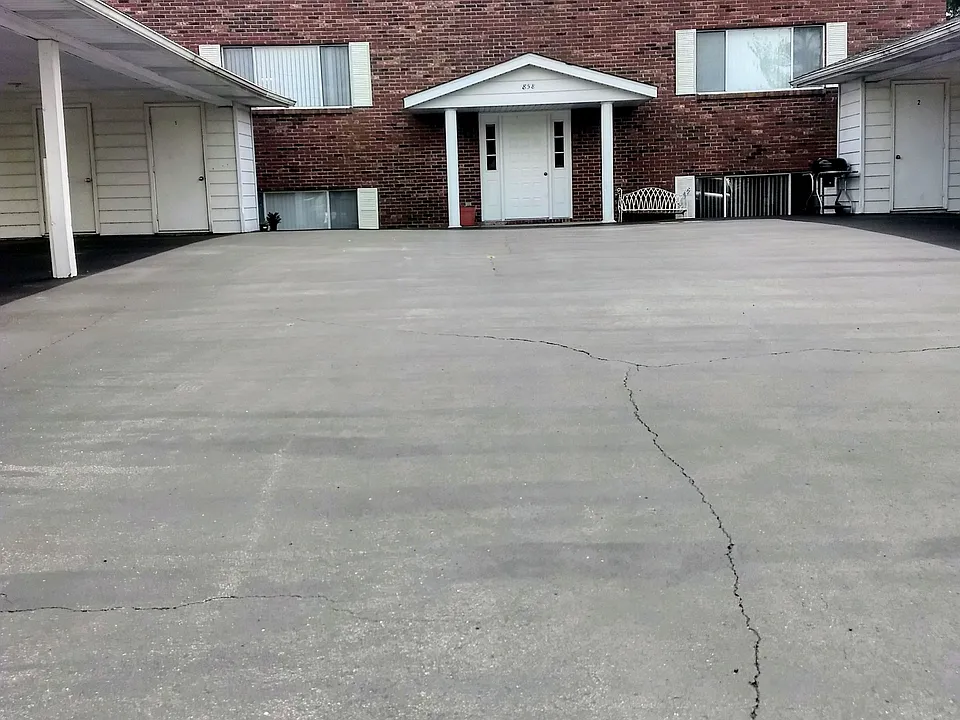 Front of building shows the storage area & the carport.