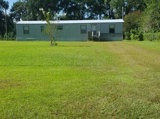 404 Wild Heron Dr, Midway, GA 31320