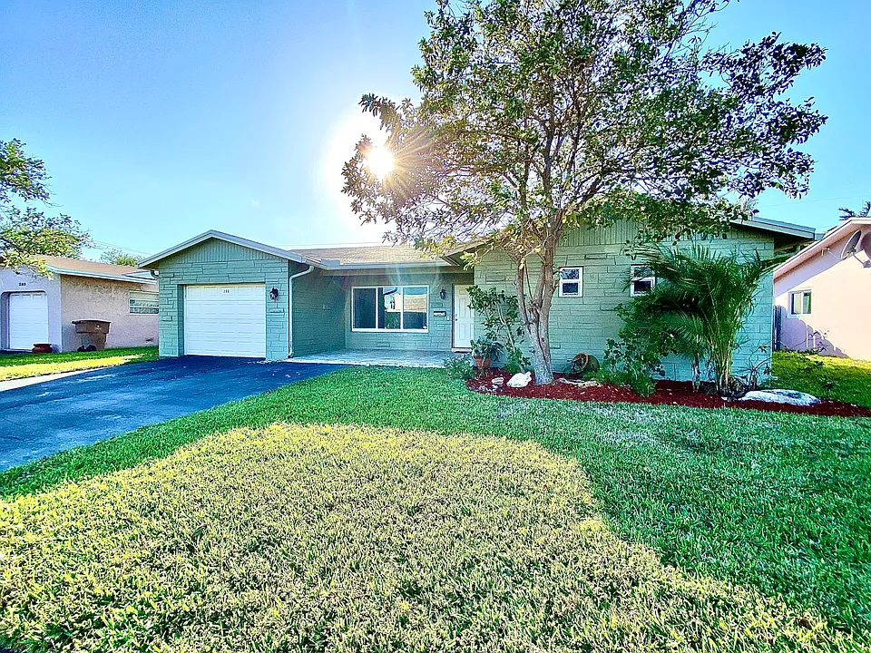 213 NE 9th Ave