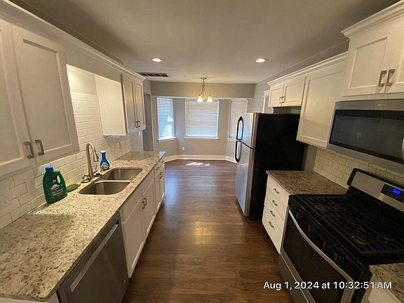 Stainless steel appliances with double sink