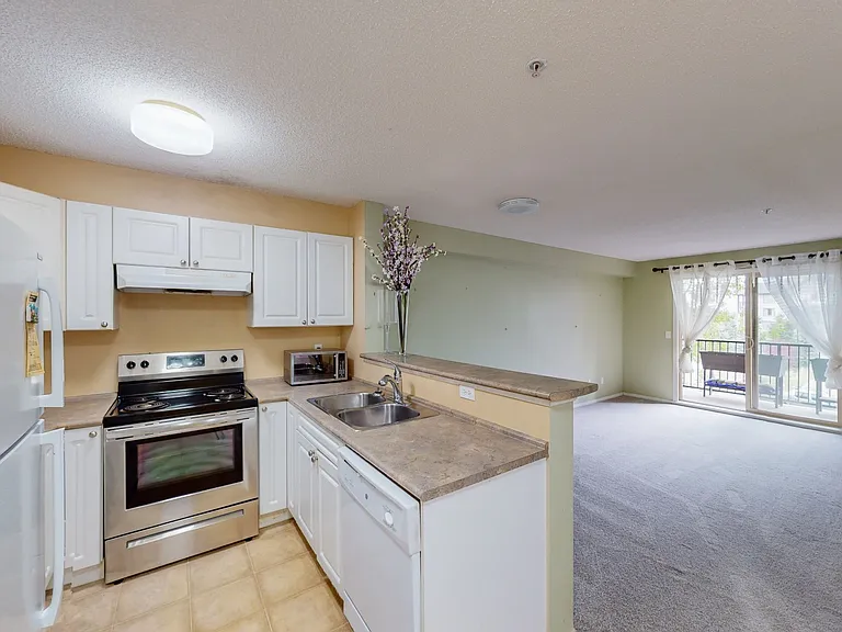 8 Bridlecrest Dr SW #2304 — Photo 1