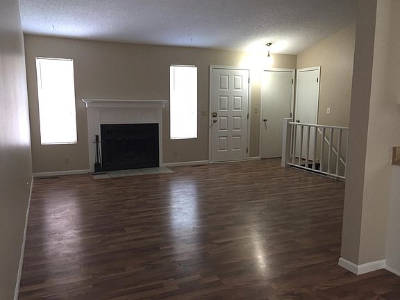 Living Room with wood-burning fireplace