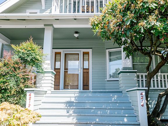 Beautiful landscaping and large front porch. 