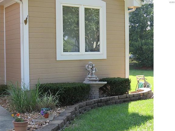 Landscaped nicely. Large shade tree in yard.