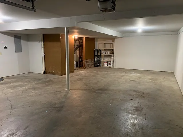 Garage easily fits three vehicles with space left