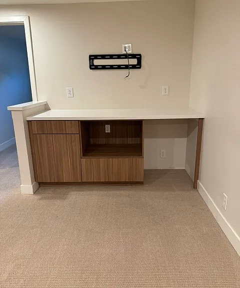 basement entertaining area and TV mount
