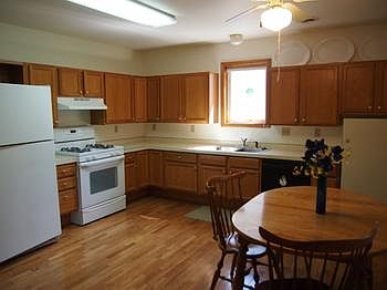 Spacious kitchen with plenty of room for a good sized table.  All kitchen appliances are included- even a freezer.  Direct access to the deck from the kitchen.