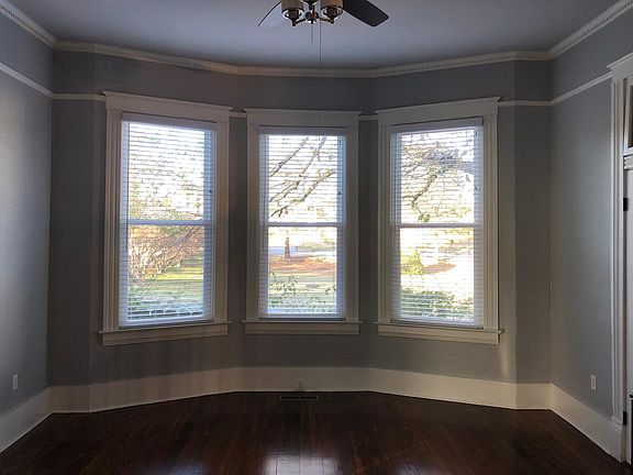 Beautifully restored study with extensive, detailed trim/woodwork, glass transoms, pocket door and bay window which provides a great view of historic Parnell Hall and its Classical Revival architecture on the campus of Arkansas School for the Deaf.