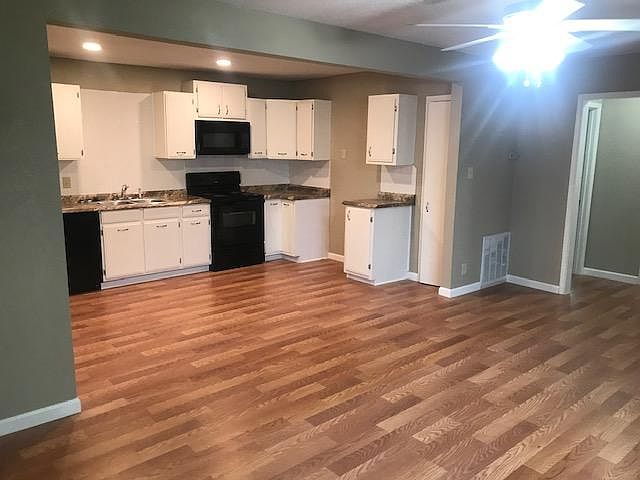 Kitchen open to large living room