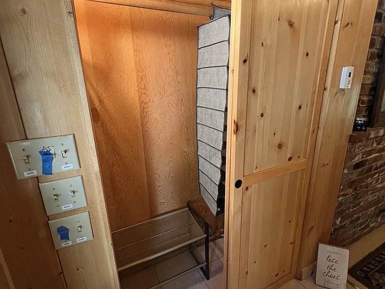 Entryway coat/shoe closet