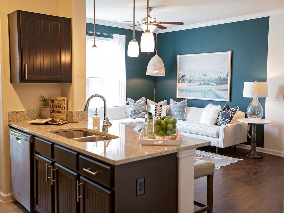 Dining area and living room with hard surface flooring throughout