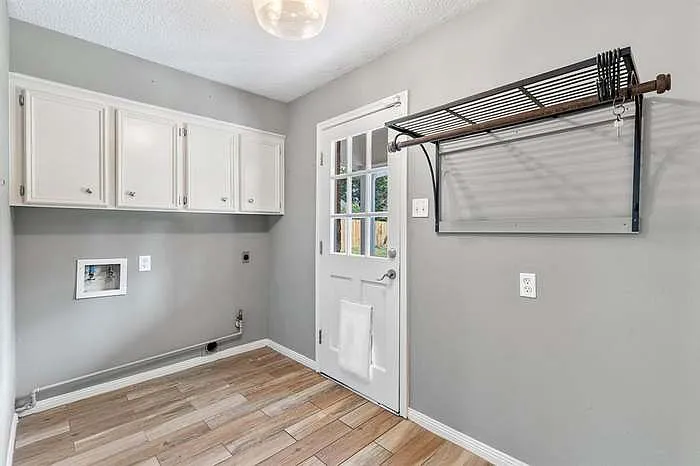 Laundry room will come with a washer and dryer.