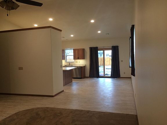 Looking from the front door into dining room and kitchen.