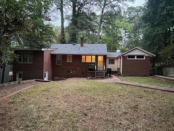 Rear view of house from backyard