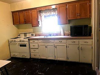 Original cabinets are SOLID! Can easily be painted or refinished for an updated look.